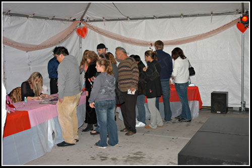 The fans crowd around the girls