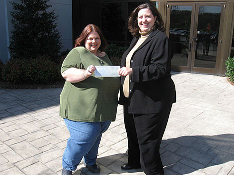 Orange County Social Services Check Presentation Image Courtesy of PHE Inc