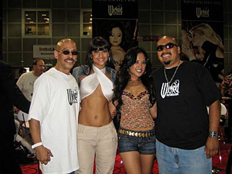 Fans pose with hot Wicked lovelies Carmen Hart and Kaylani Lei