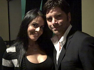 John Stamos and Mikayla share a moment backstage at the Music Cares Person of the Year Charity Event