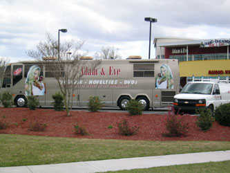 Adam and Eve RV in front of store